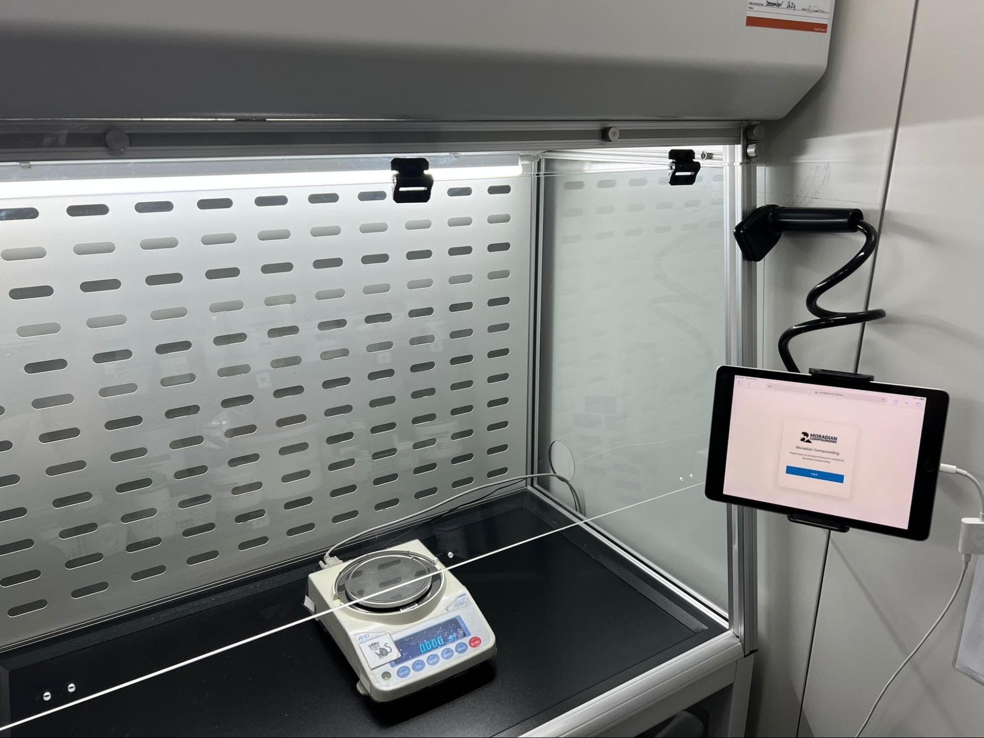 iPad secured with clamp mount in the compounding lab