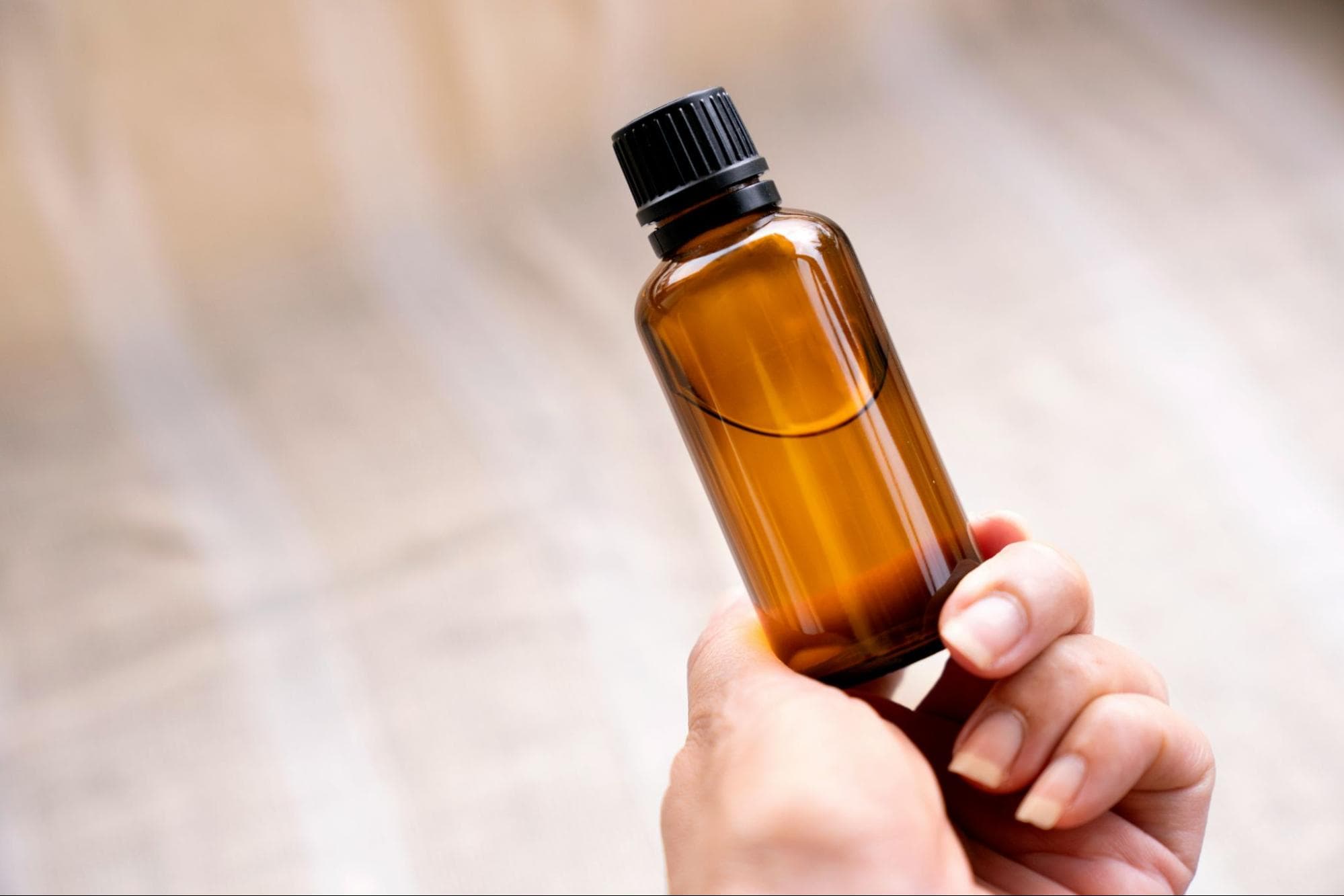 holding bottle mockup